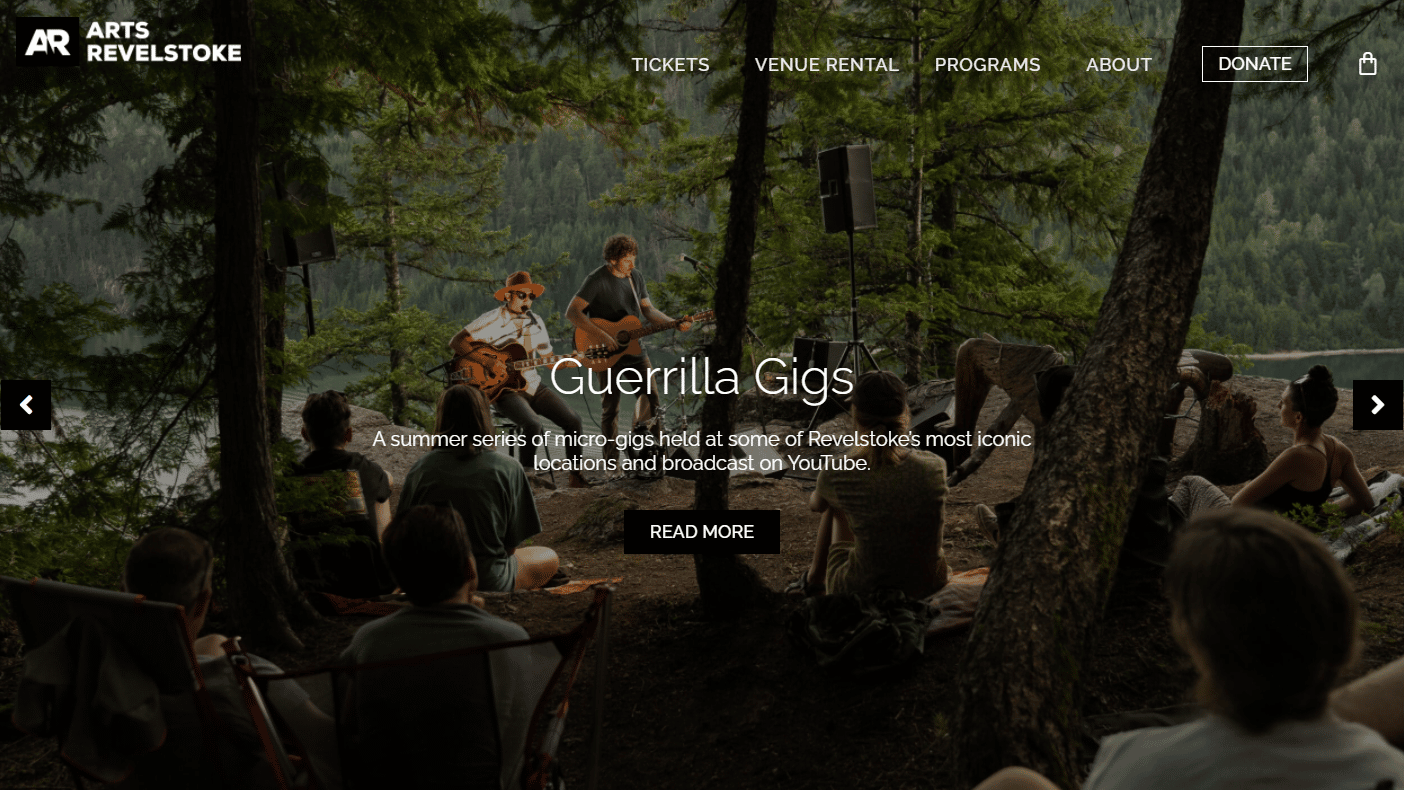 Home page of Arts Revelstoke with image of concert in the woods